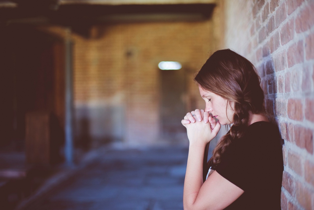 praying with our friend